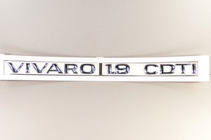Напис "VIVARO 1.9 CDTI" (задні двері, хром) на Opel Vivaro 2001-> 2006 - Opel (оригінал) - 93853158